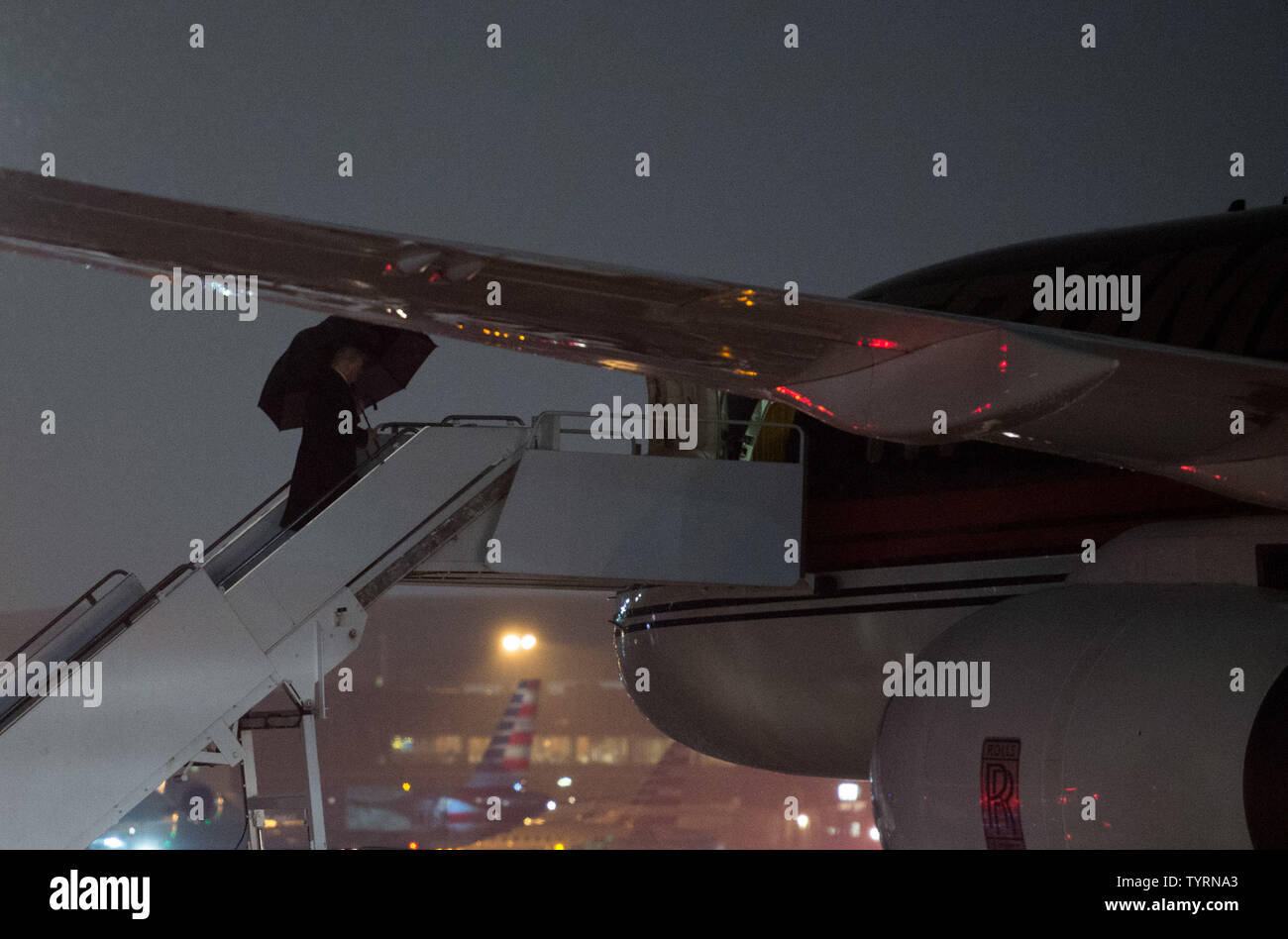 U.S. President-elect Donald Trump boards his plane at LaGuardia airport on January 17, 2017 in New York City.    Photo by Bryan R. Smith/UPI Stock Photo