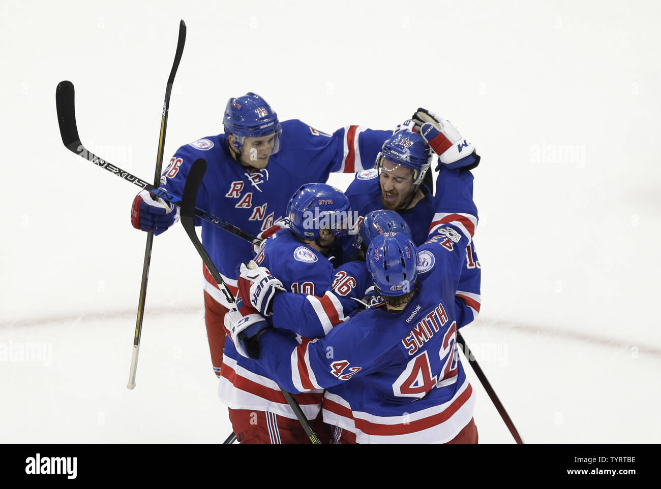 New York Rangers players celebrate a goal by Mats Zuccarello in the 2nd