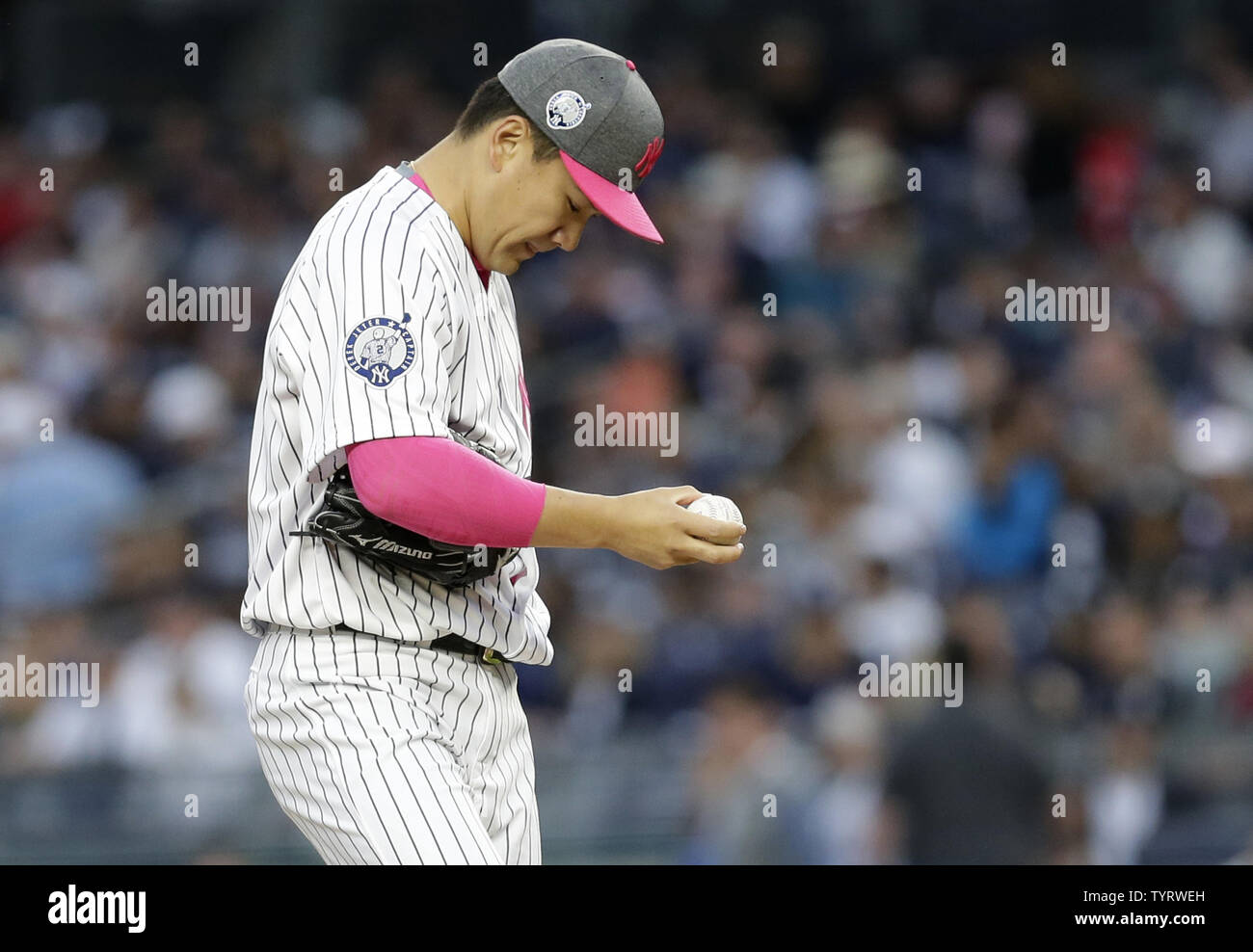 New York Yankees starting pitcher Masahiro Tanaka reacts after giving up a lead off home run to Houston Astros George Springer in the first inning at Yankee Stadium in New York City on May 14, 2017. The New York Yankees former shortstop Derek Jeter before the game had his No. 2 retired and was also honored with a plaque in Monument Park.     Photo by John Angelillo/UPI Stock Photo