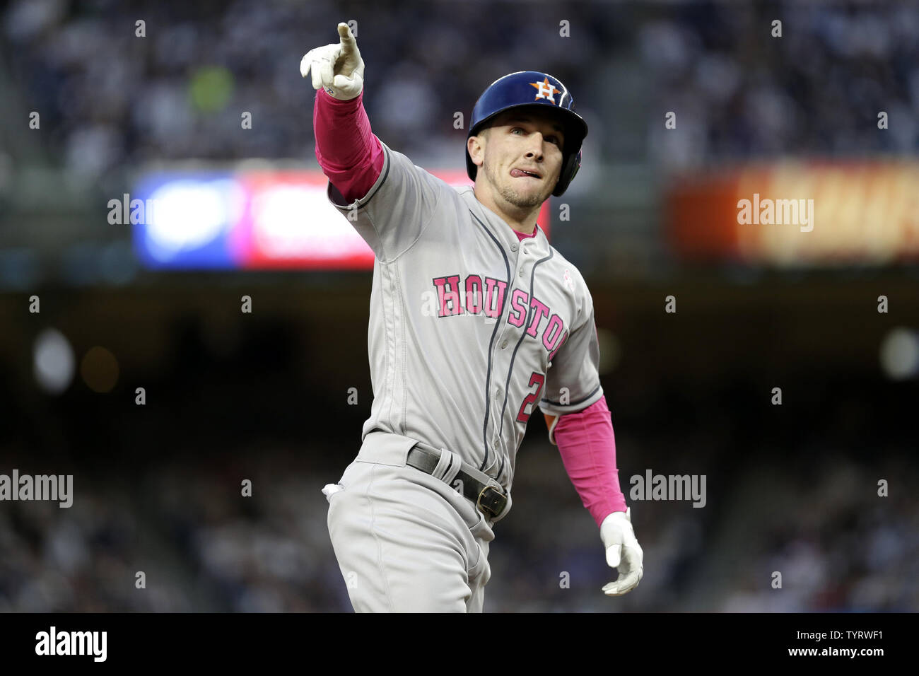 Houston Astros Alex Bregman celebrates after hitting a grand slam in the first inning off of New York Yankees starting pitcher Masahiro Tanaka at Yankee Stadium in New York City on May 14, 2017. The New York Yankees former shortstop Derek Jeter before the game had his No. 2 retired and was also honored with a plaque in Monument Park.     Photo by John Angelillo/UPI Stock Photo