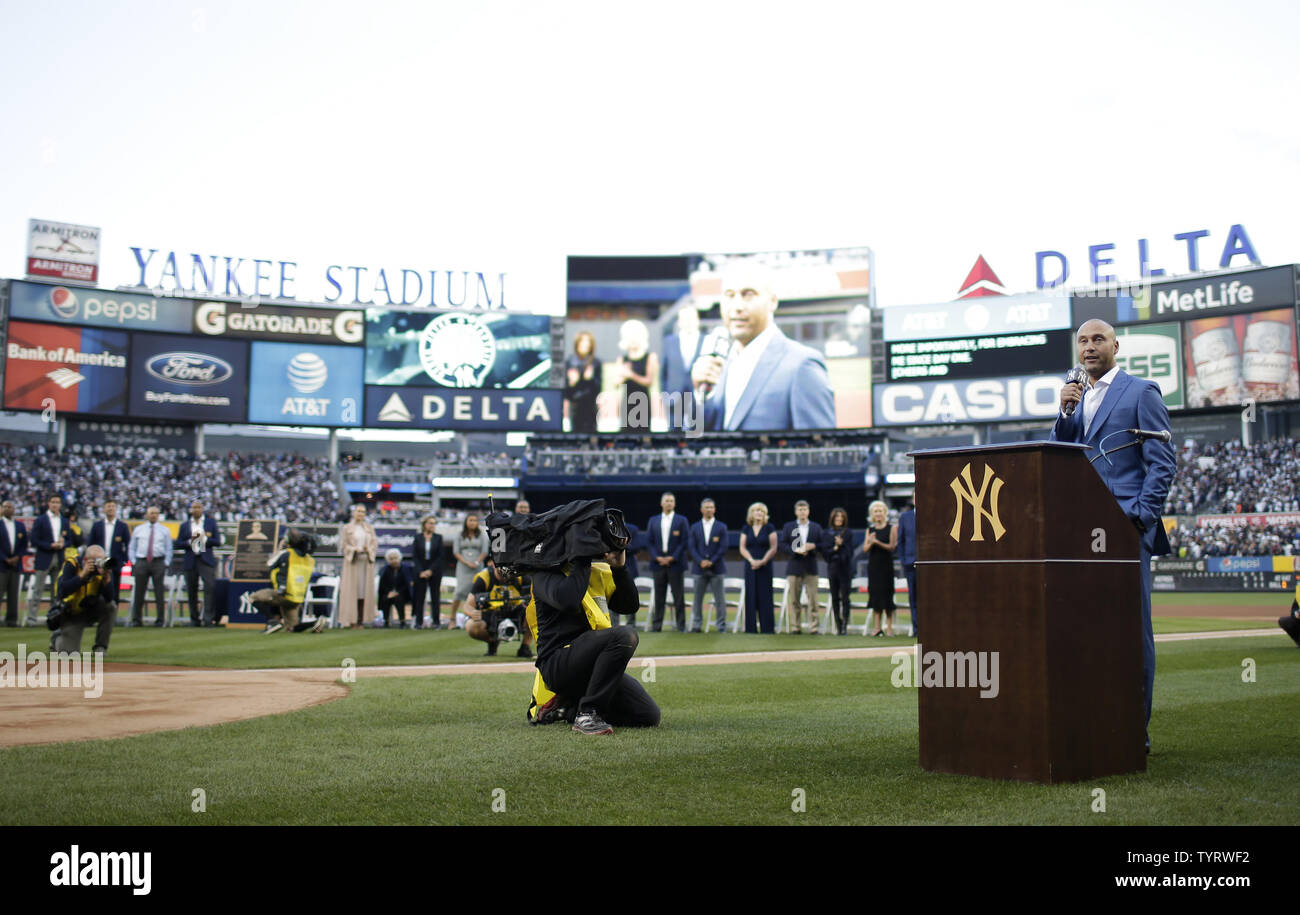 Derek Jeter speaks on the field at a ceremony retiring his number before the Houston Astros play the New York Yankees at Yankee Stadium in New York City on May 14, 2017. The New York Yankees former shortstop had his No. 2 retired and was also honored with a plaque in Monument Park.     Photo by John Angelillo/UPI Stock Photo