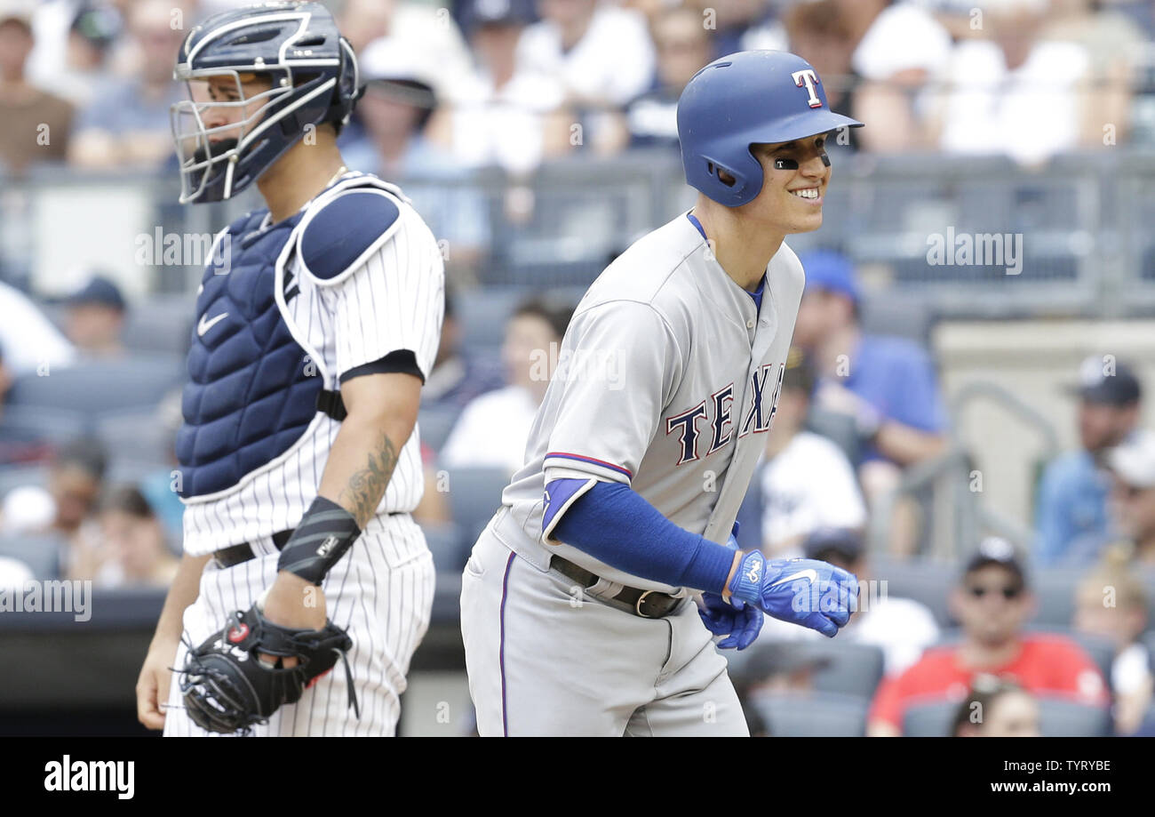 Texas Rangers Drew Robinson smiles after crossing home plate after hitting a solo home run in the 5th against the New York Yankees at Yankee Stadium in New York City on June 25, 2017.    Photo by John Angelillo/UPI Stock Photo
