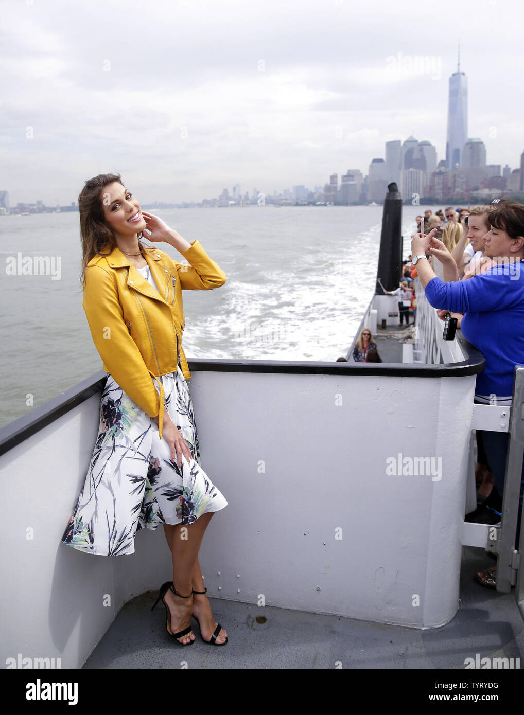 Miss Universe Iris Mittenaere of France poses for photos with a view of One World Trade Center while on a ferry cruise to the Statue of Liberty on June 27, 2017 in New York City. Iris was crowned Miss Universe on Sunday, January 29, in the Philippines and this was the first time ever Miss Universe visited the pedestal of the Statue of Liberty.   Photo by John Angelillo/UPI Stock Photo