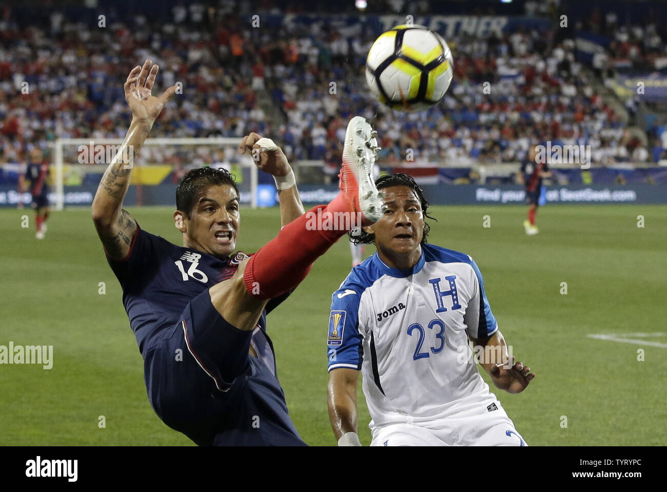 Honduras Carlos Sanchez watches Costa Rica Christian Gamboa kick the ball in the first half at the Concacaf Gold Cup 2017 at Red Bull Arena in Harrison New Jersey on July 7, 2017.   Photo by John Angelillo/UPI Stock Photo