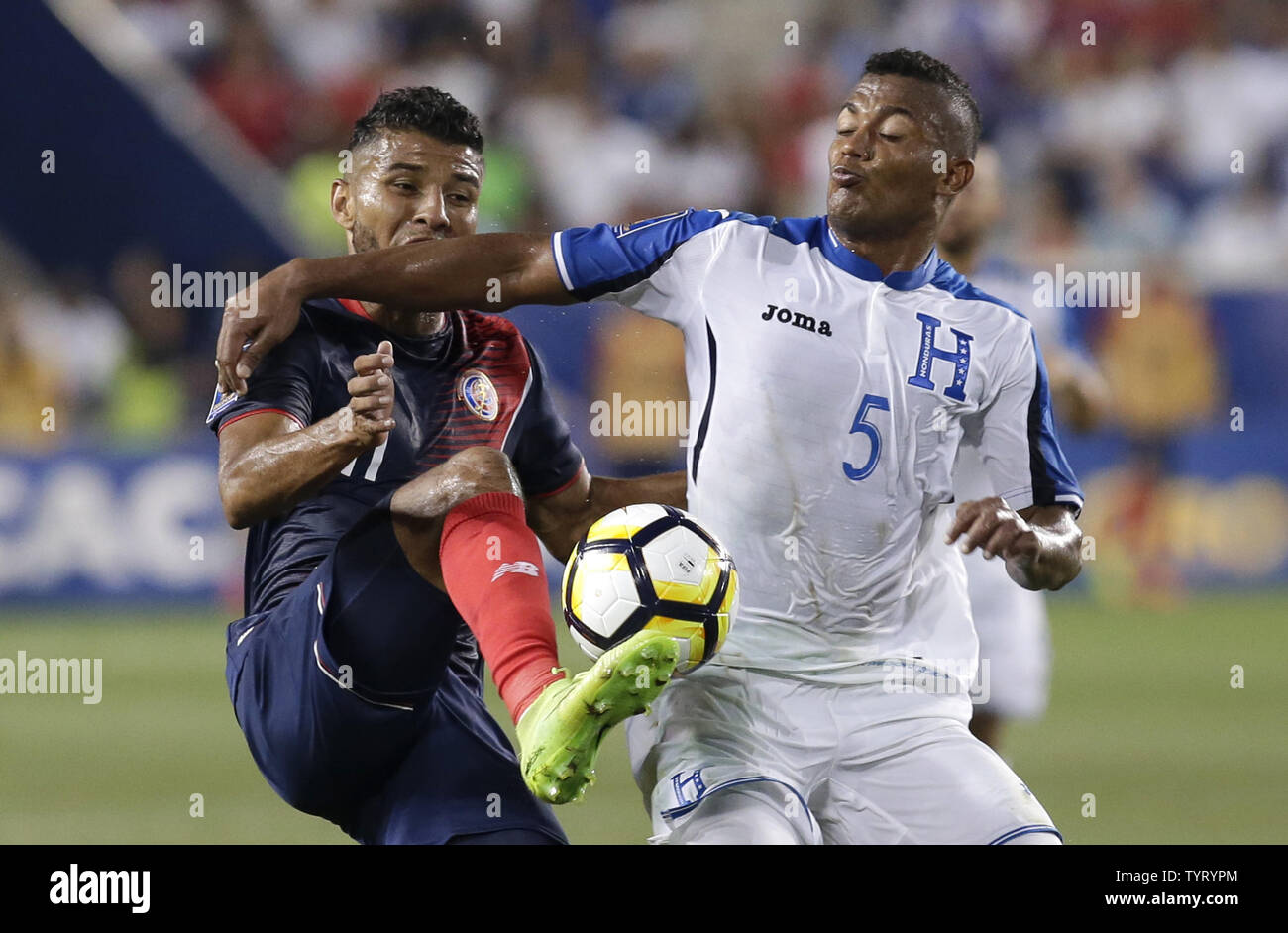 Costa Rica Johan Venegas and Honduras Ever Alvarado in the first half at  the Concacaf Gold Cup 2017 at Red Bull Arena in Harrison New Jersey on July  7, 2017. Photo by