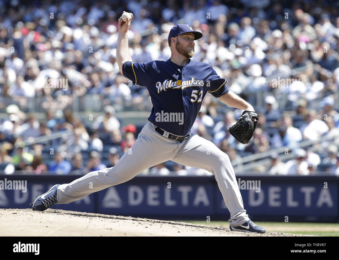 Milwaukee Brewers starting pitcher Jimmy Nelson throws a pitch in the