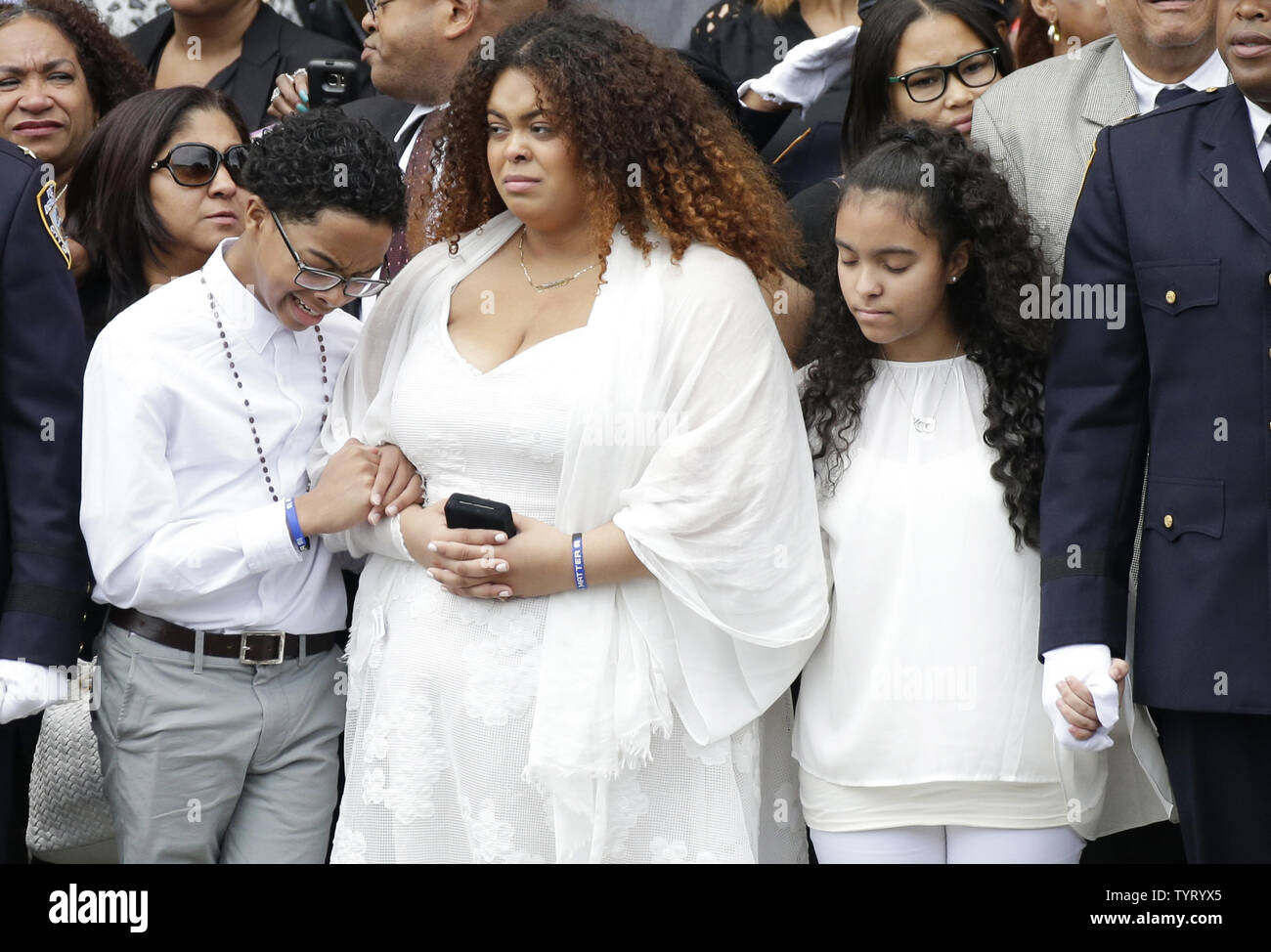 Peter, Genesis and Delilah, children of fallen Police officer Miosotis