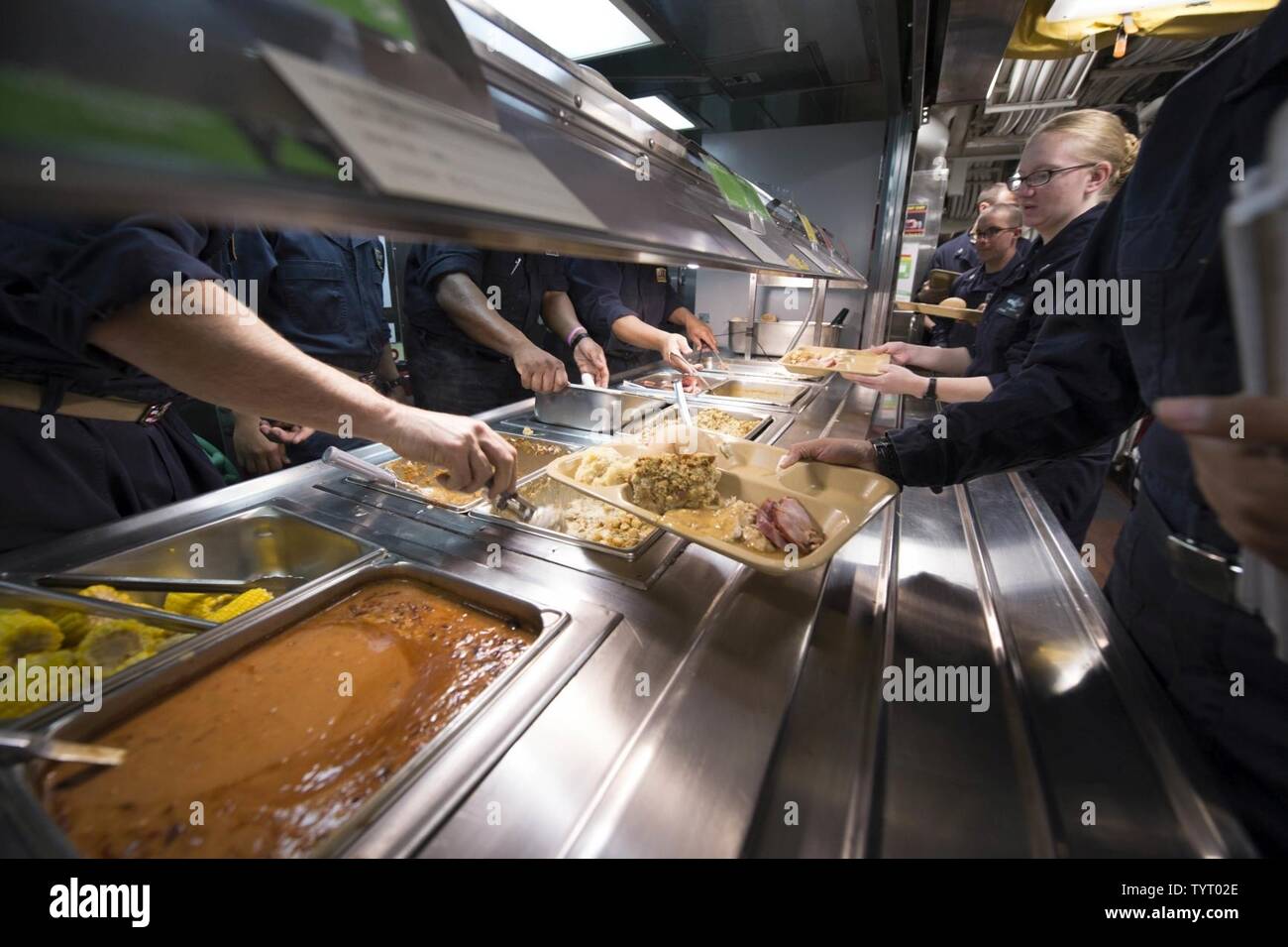 SEA (Nov. 24, 2016) Sailors aboard USS Carney (DDG 64) are served a