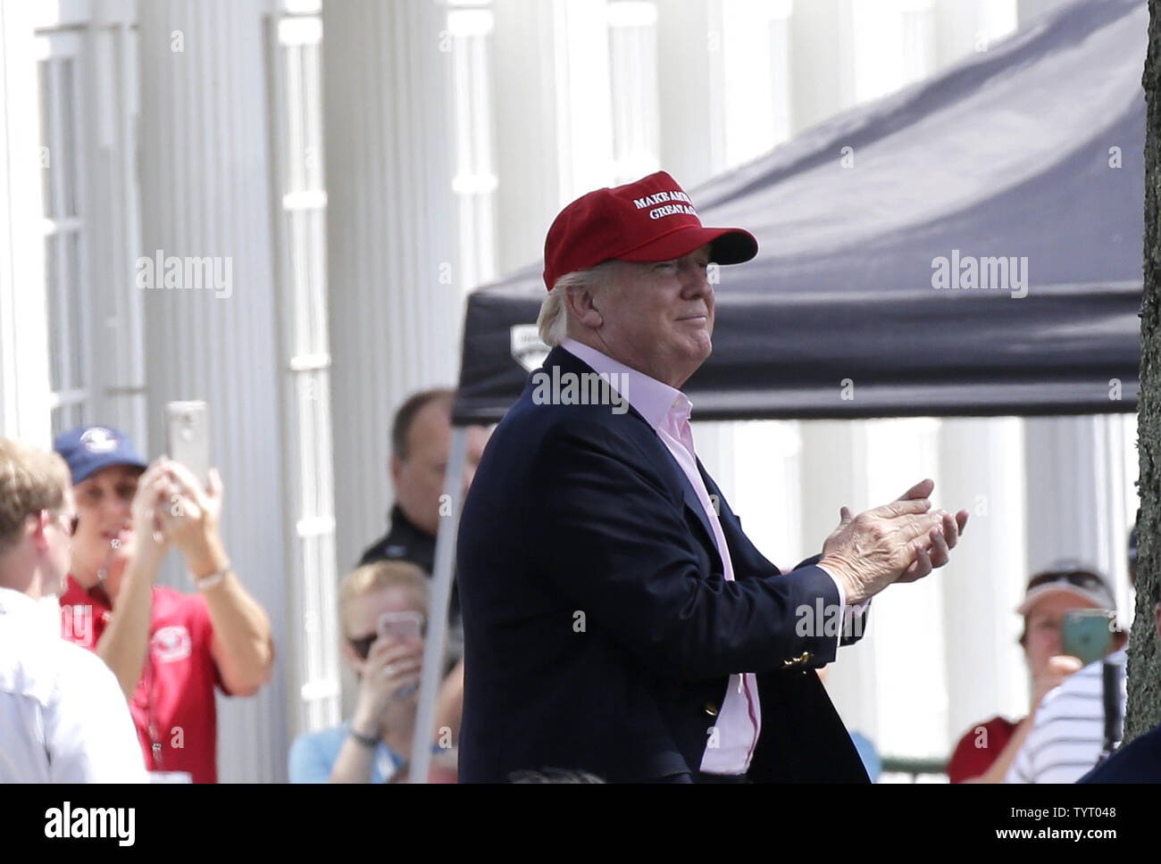 United States President Donald Trump arrives at Trump National Golf Club for the final round of the LPGA U.S. Women's Open Championship  in Bedminster, NJ on July 14, 2017.     Photo by John Angelillo/UPI Stock Photo