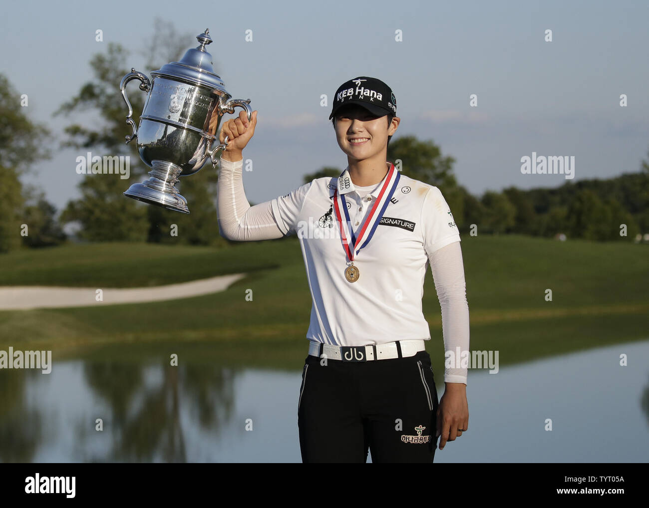 Rookie Sung Hyun Park of South Korea holds the championship trophy at Trump National Golf Club after the final round of the LPGA U.S. Women's Open Championship  in Bedminster, NJ on July 14, 2017. Park wins her first major with a score of 11 under par.      Photo by John Angelillo/UPI Stock Photo
