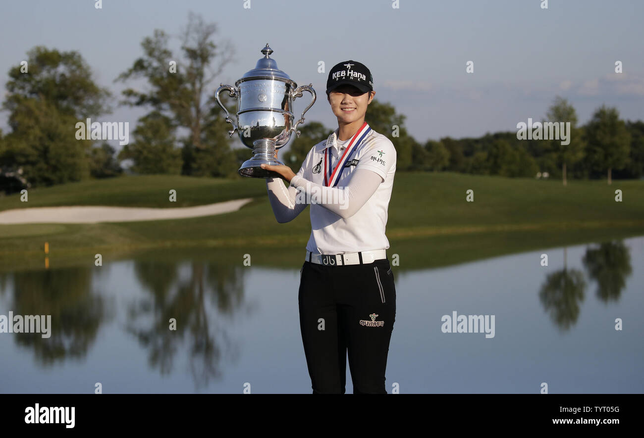 Rookie Sung Hyun Park of South Korea holds the championship trophy at Trump National Golf Club after the final round of the LPGA U.S. Women's Open Championship  in Bedminster, NJ on July 14, 2017. Park wins her first major with a score of 11 under par.      Photo by John Angelillo/UPI Stock Photo