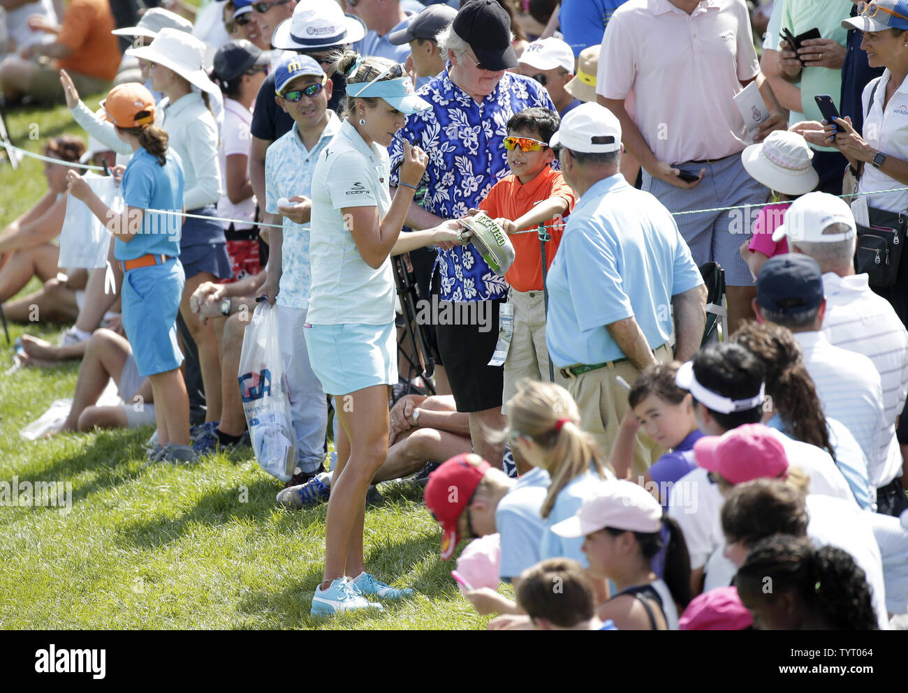 Lexi Thompson signs autographs after her round at Trump National Golf Club after the final round of the LPGA U.S. Women's Open Championship in Bedminster, NJ on July 14, 2017. Sung Hyun Park won her first major with a score of 11 under par.      Photo by John Angelillo/UPI Stock Photo