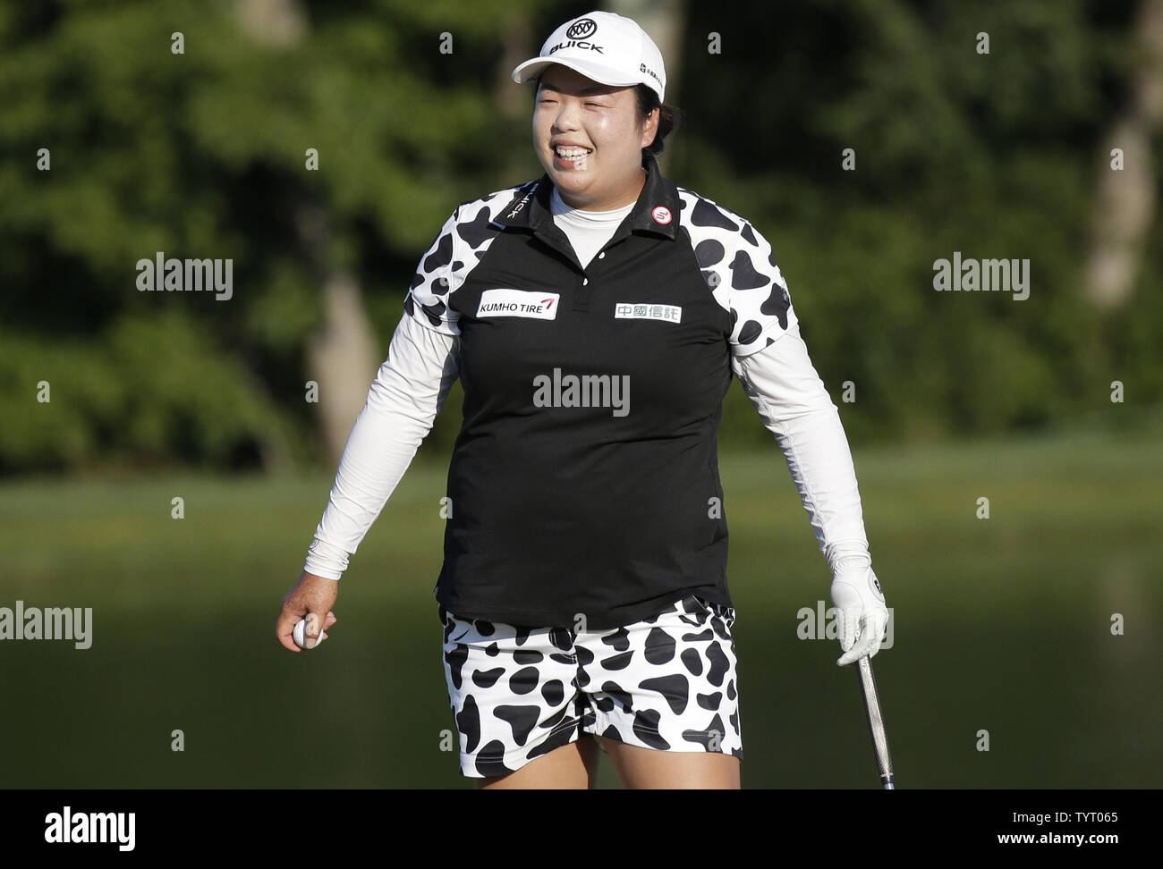 Shanshan Feng of China reacts on the 18th green after her round at Trump National Golf Club in the final round of the LPGA U.S. Women's Open Championship  in Bedminster, NJ on July 14, 2017. Sung Hyun Park wins her first major with a score of 11 under par.      Photo by John Angelillo/UPI Stock Photo