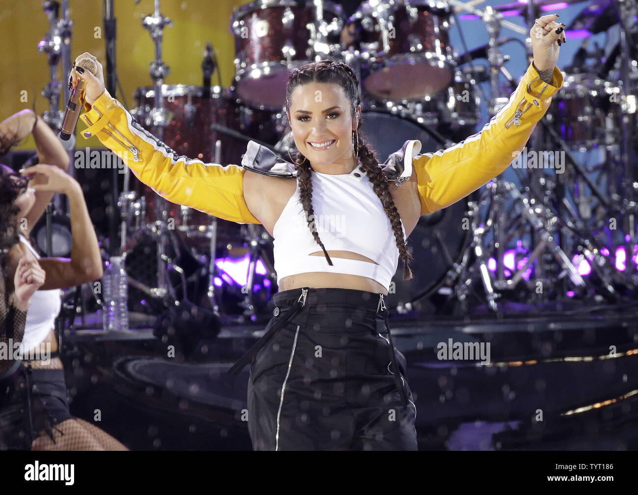 Demi Lovato performs in the rain on the Good Morning America Show at the Rumsey Playfield/SummerStage in Central Park in New York City on August 18, 2017.      Photo by John Angelillo/UPI Stock Photo