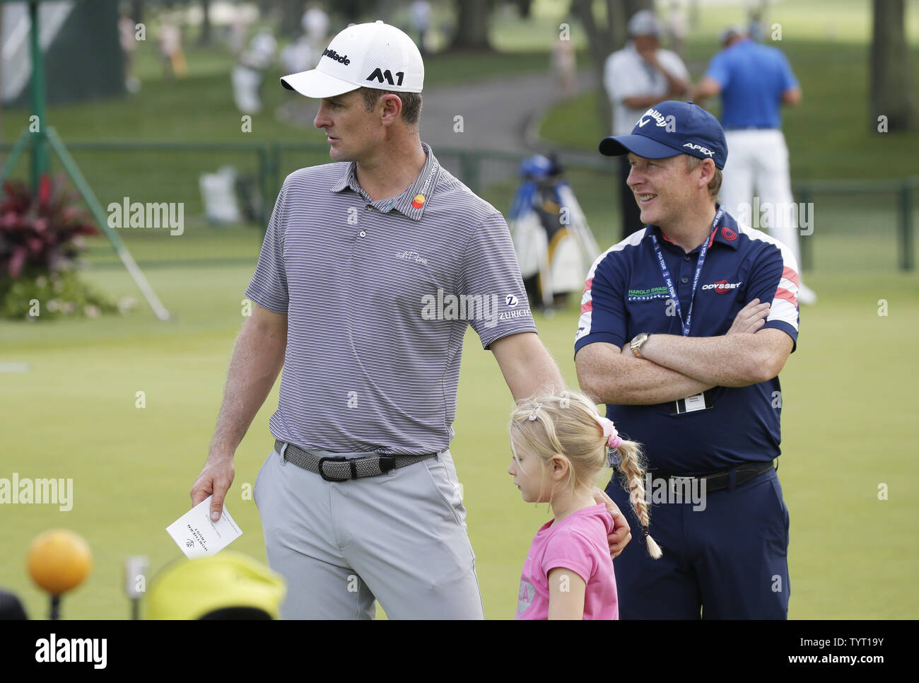 Justin Rose of England stands on the practice green wth daughter Charlotte Rose at a practice round before The Northern Trust golf championship at the Glen Oaks Club in Old Westbury, New York on August 22, 2017. Glen Oaks Club is hosting THE NORTHERN TRUST for the first time.     Photo by John Angelillo/UPI Stock Photo