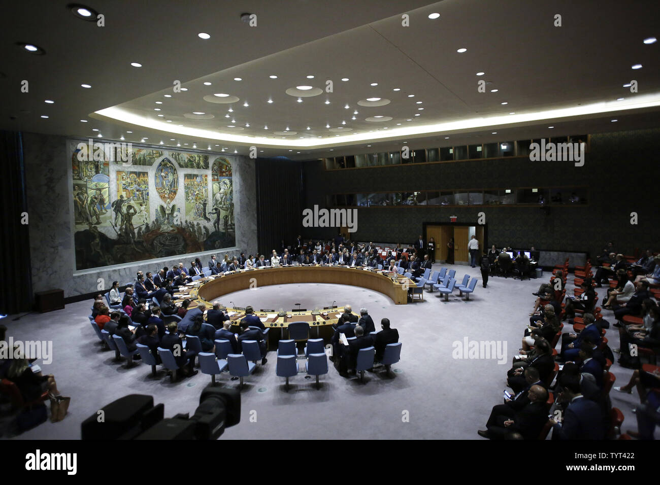 Attendees sit at the United Nations Security Council meeting on threats