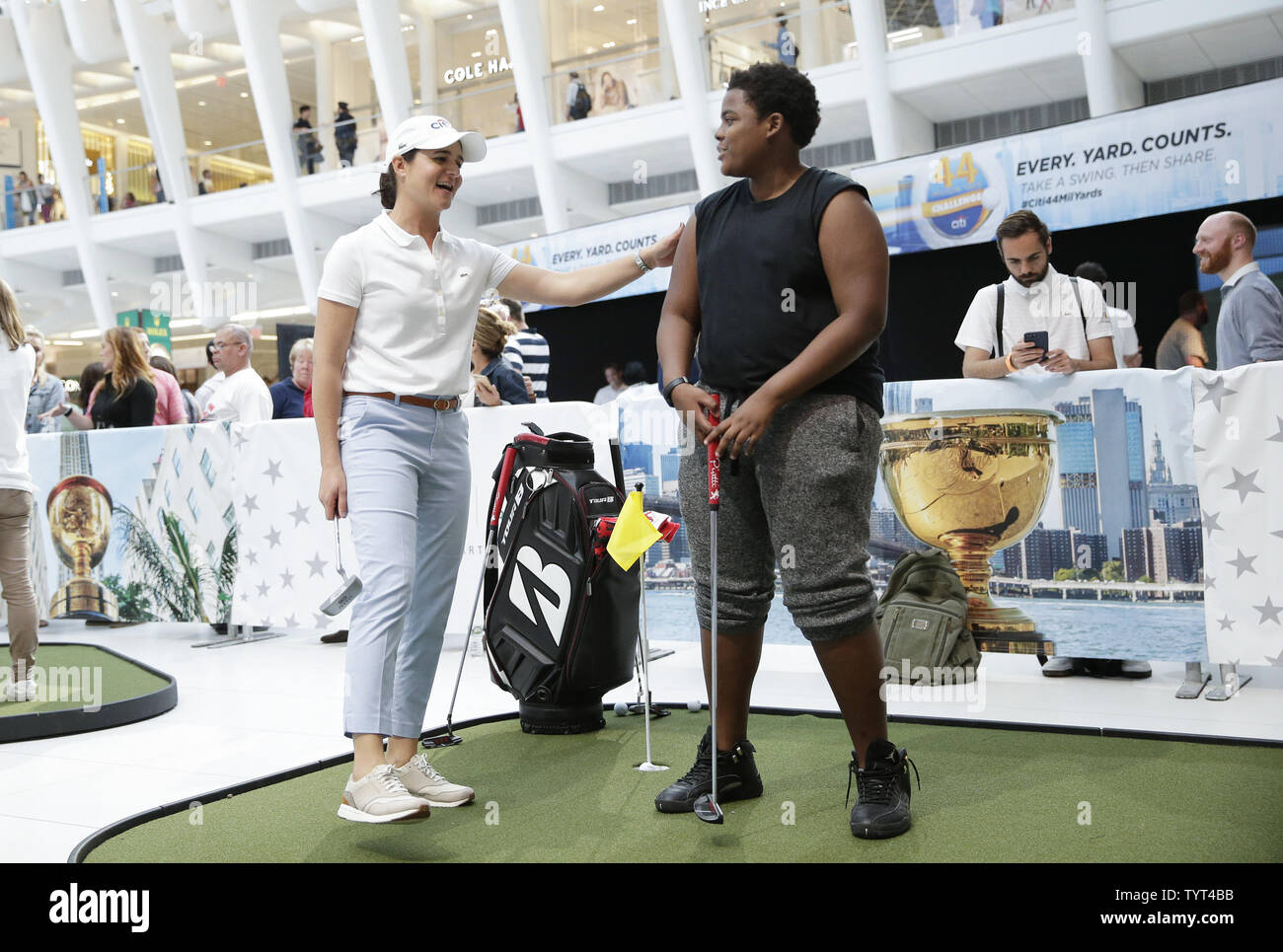 Former Lpga Professional Golfer Lorena Ochoa Watches A Fan