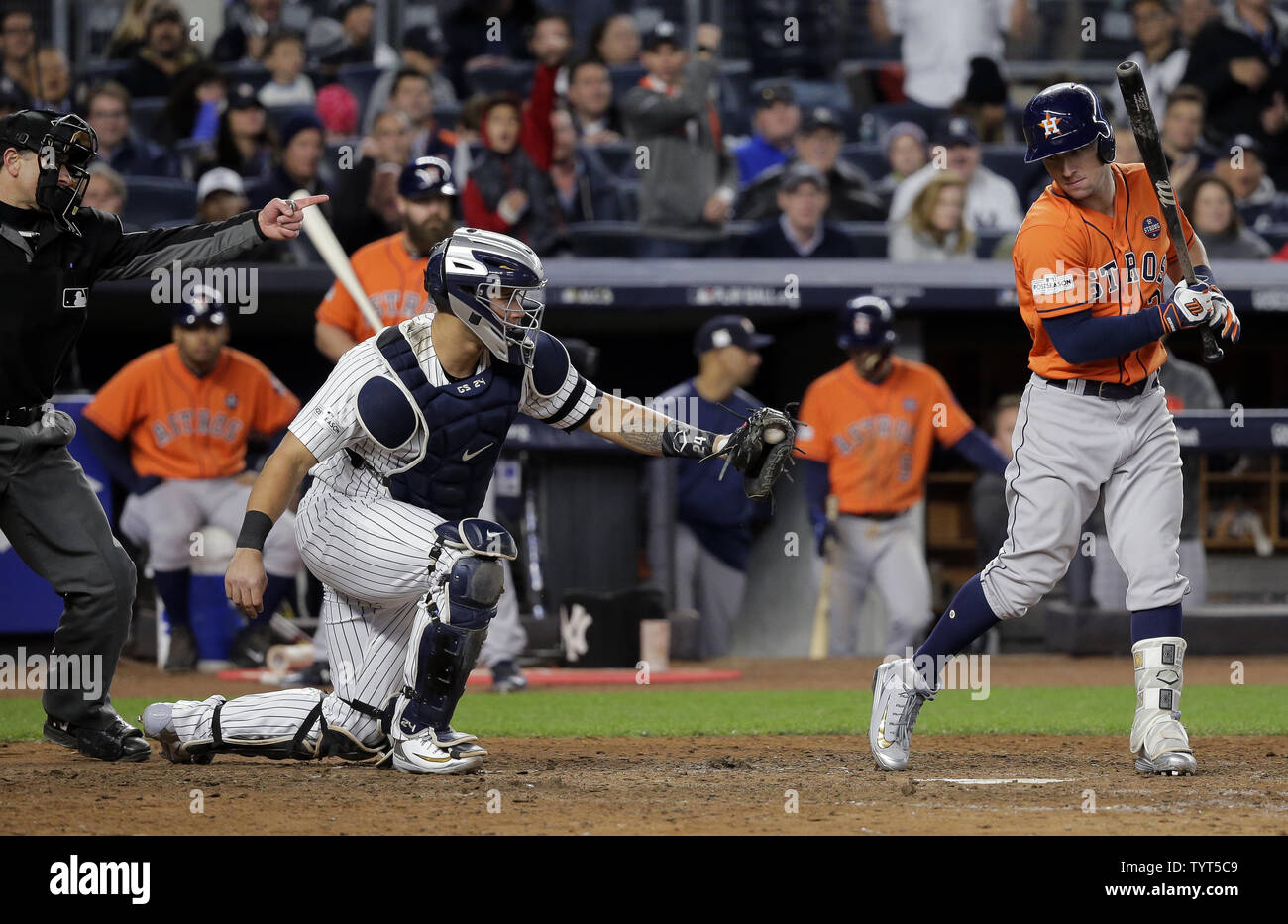 New York Yankees catcher Gary Sanchez (C) reacts as umpire Chris Guccione (L) calls out Houston Astros batter Alex Bregman (R) in the ninth inning in game 4 of the 2017 MLB Playoffs American League Championship Series at Yankee Stadium in New York City on October 17, 2017.      Photo by Ray Stubblebine/UPI Stock Photo