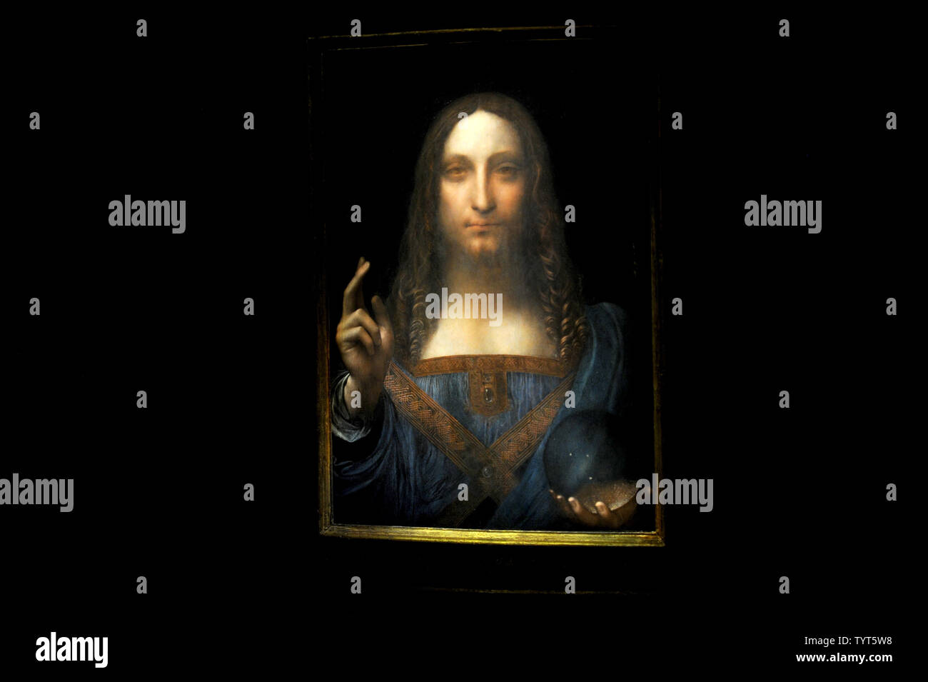Leonardo da Vinci's "Salvator Mundi" painting is on display at a press