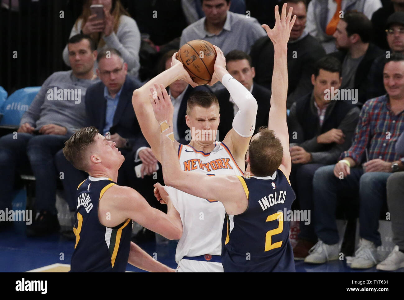 Utah Jazz Joe Ingles and Jonas Jerebko surround New York Knicks