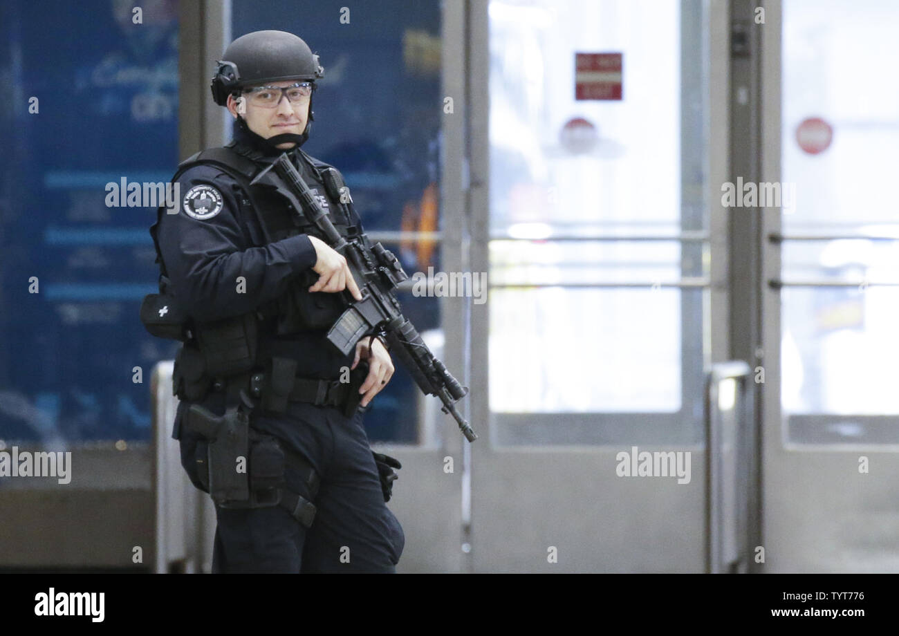 An NYPD Port Authority Police CounterTerrorism Unit officer stands