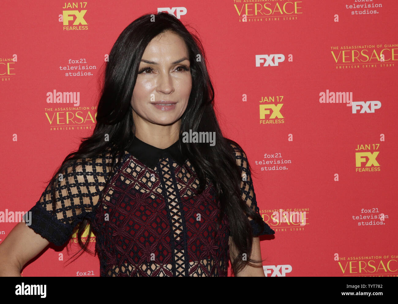 Famke Janssen arrives on the red carpet at 'The Assassination Of Gianni