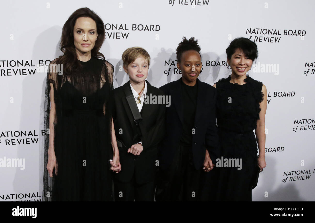 Angelina Jolie, Shiloh Jolie-Pitt, Zahara Jolie-Pitt, and Loung Ung arrive on the red carpet at the National Board of Review Annual Awards Gala at Cipriani 42nd Street in New York City on January 9, 2018. The National Board of Review's awards celebrate excellence in filmmaking with categories that include Best Picture, Best Director, Best Actor and Actress, Best Original and Adapted Screenplay, Breakthrough Performance, and Directorial Debut, as well as signature honors such as the Freedom of Expression.        Photo by John Angelillo/UPI Stock Photo