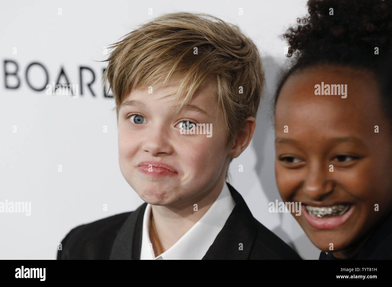 Shiloh Jolie-Pitt and Zahara Jolie-Pitt arrive on the red carpet at the National Board of Review Annual Awards Gala at Cipriani 42nd Street in New York City on January 9, 2018. The National Board of Review's awards celebrate excellence in filmmaking with categories that include Best Picture, Best Director, Best Actor and Actress, Best Original and Adapted Screenplay, Breakthrough Performance, and Directorial Debut, as well as signature honors such as the Freedom of Expression.        Photo by John Angelillo/UPI Stock Photo