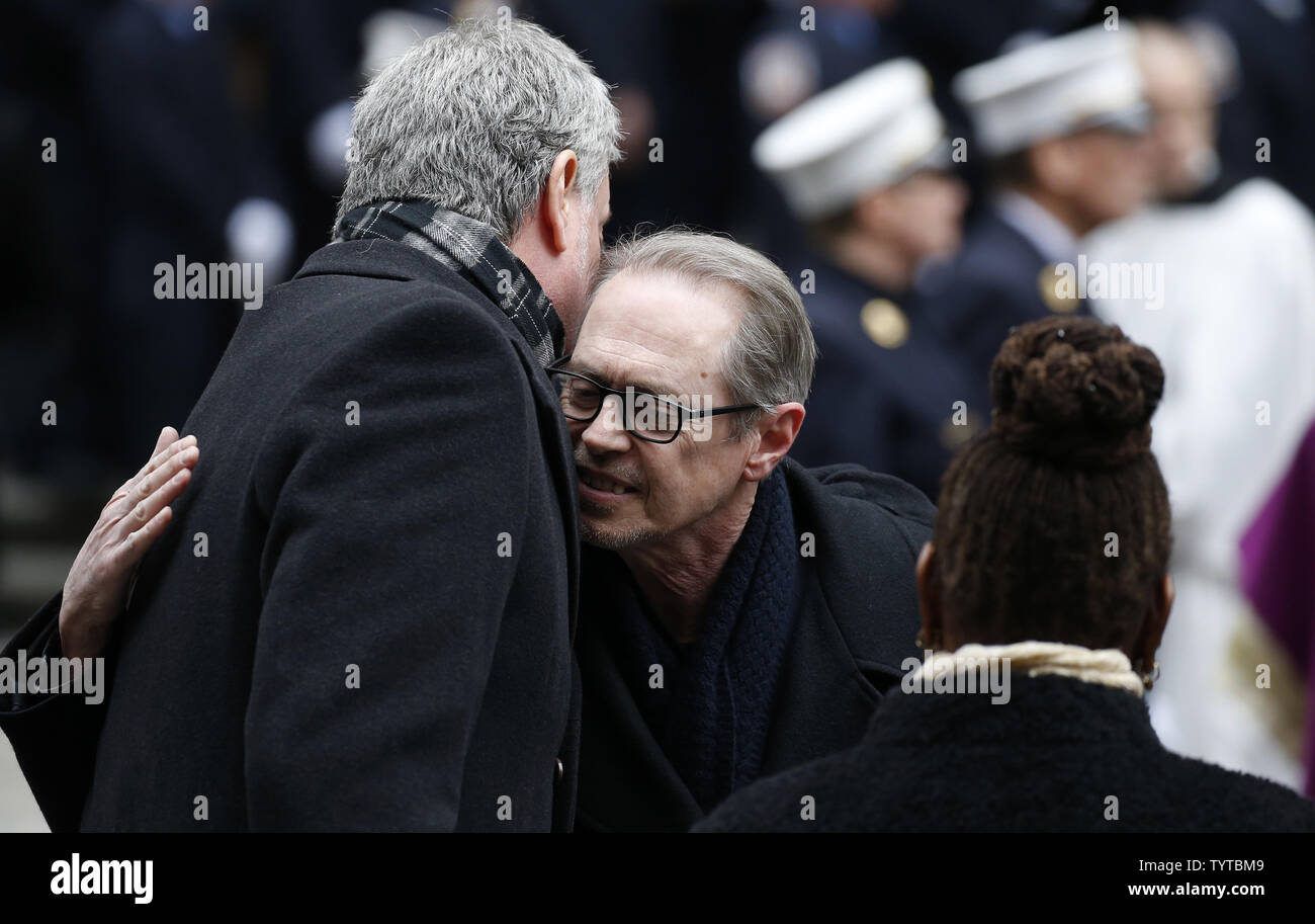 Steve Buscemi and New York Mayor Bill de Blasio exchange words after the funeral of New York firefighter Michael R. Davidson at St. Patricks Cathedral in New York City on March 27, 2018. The fire which broke out last week in the basement of 773 St. Nicholas Avenue in Harlem was being used as a filming location for a movie directed by Edward Norton. New York firefighter Michael R. Davidson was killed and two others were seriously injured.      Photo by John Angelillo/UPI Stock Photo