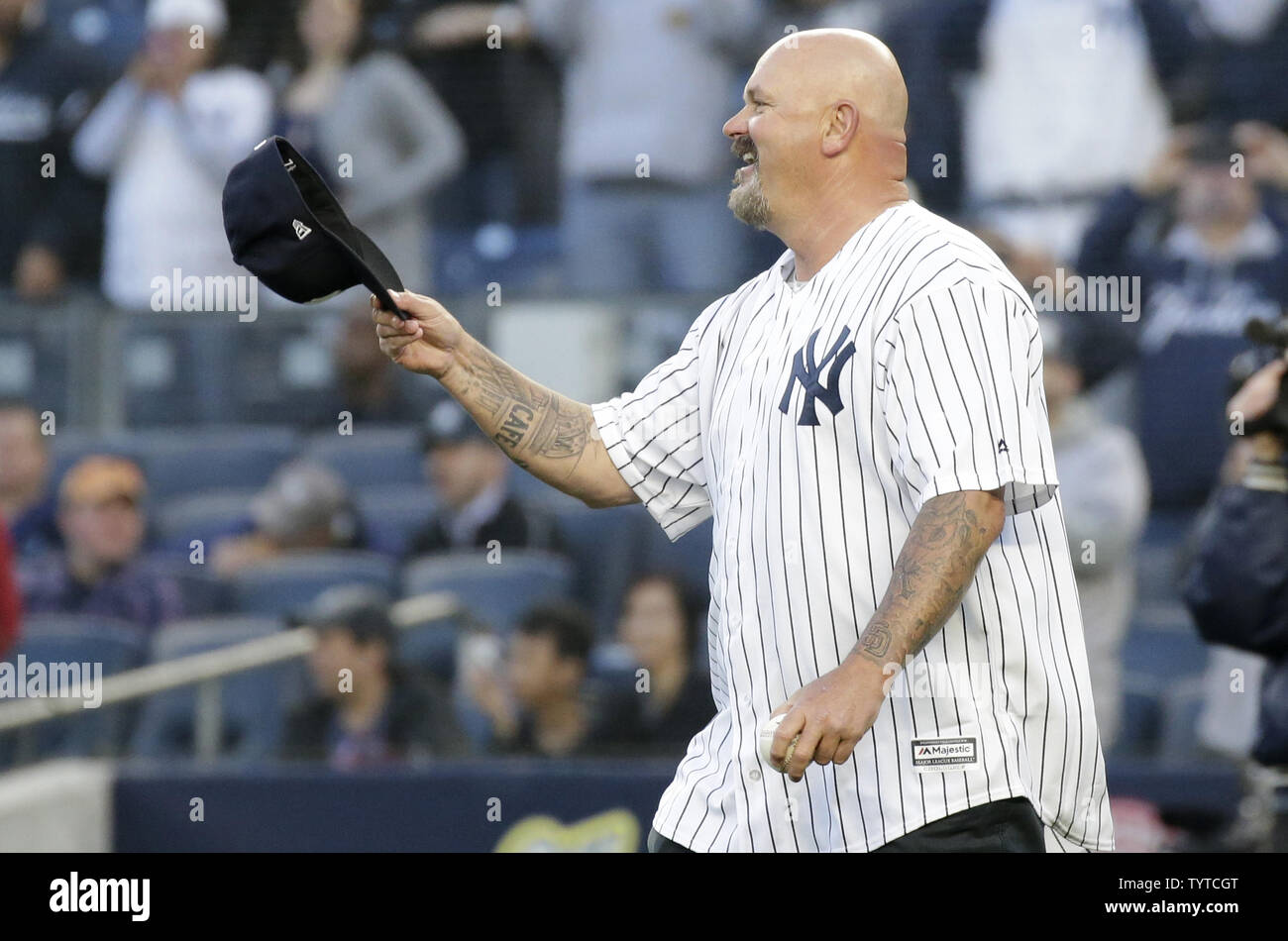 Chris Pine dressed casually wearing a New York Yankees baseball