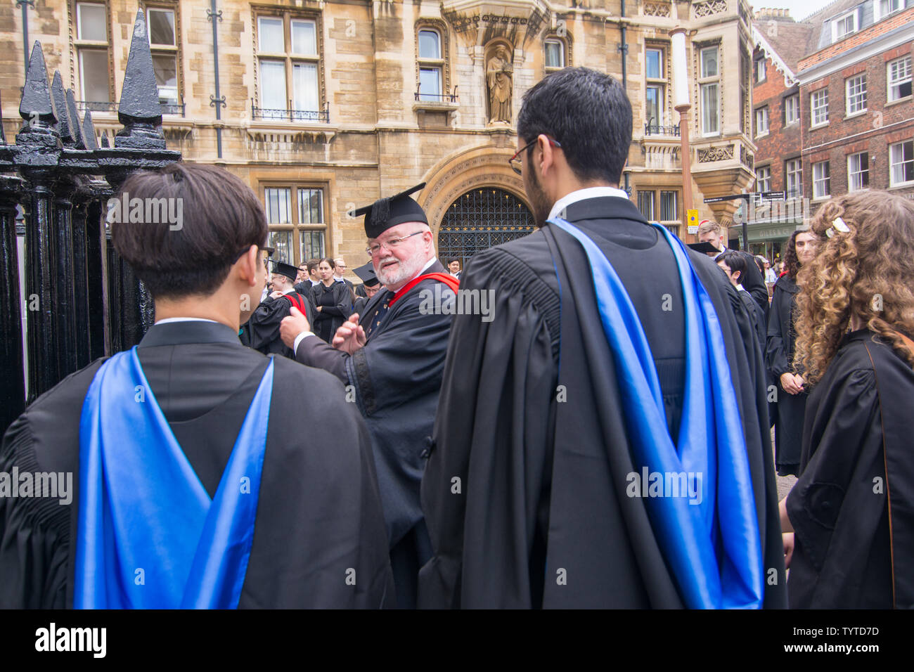 colour of graduation gowns has a meaning sybolizing something pale blue education and scarlet theology TYTD7D