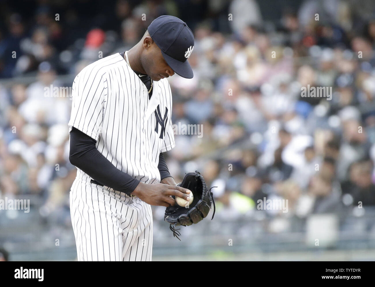 New York Yankees starting pitcher Domingo German stands on the pitchers