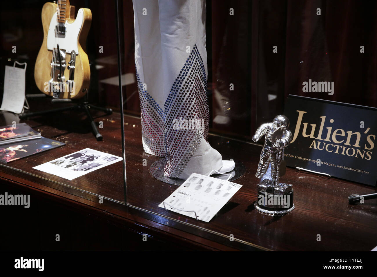 Cloths, Awards, Musical Instruments and Rock and Roll memorabilia are
