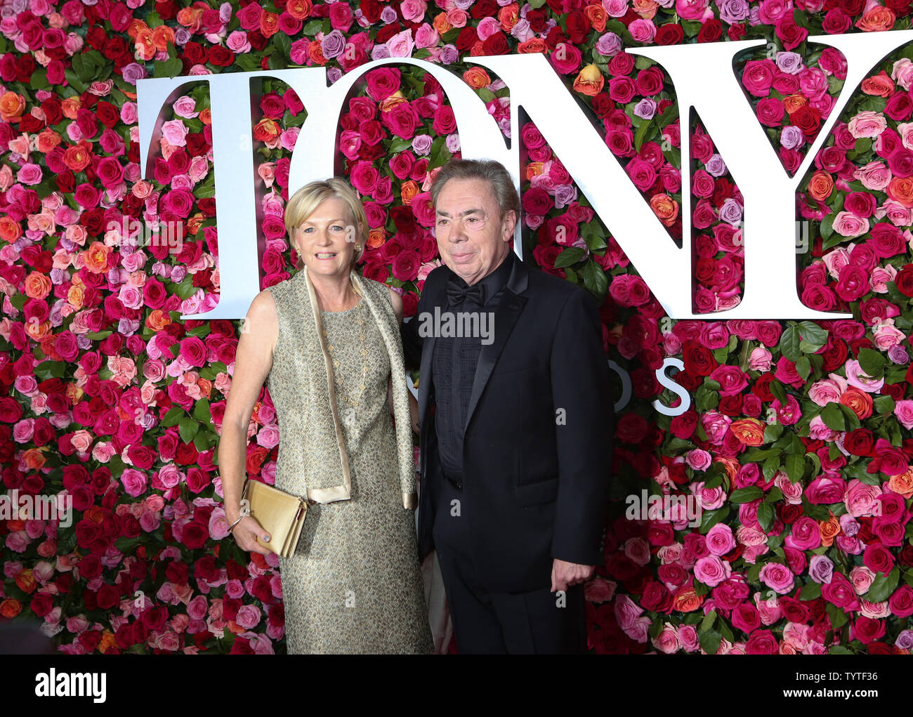Madeleine Gurdon and Andrew Lloyd ber arrive on the red carpet at