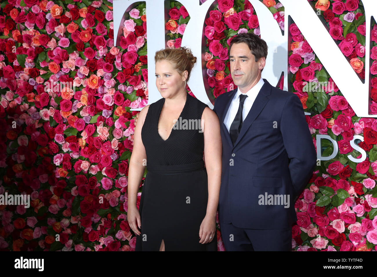 Amy Schumer and Fischer arrive on the red carpet at the 72nd Annual Tony Awards at Radio City Music Hall on June 10, 2018 in New York City. Photo by Serena