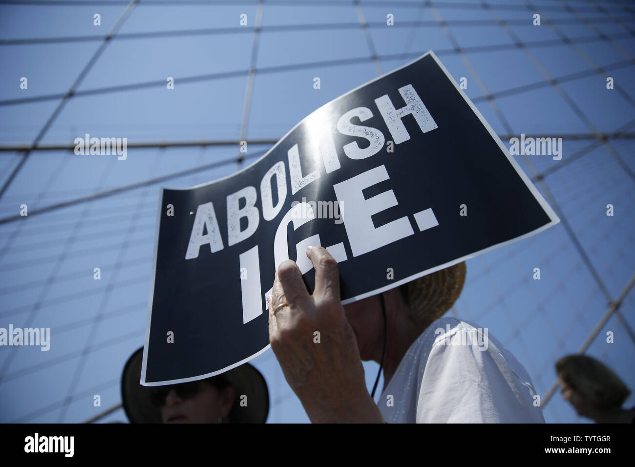 Protesters hold up signs at the End Family Separation NYC Rally and March in New York City on June 30, 2018. Demonstrators gathered in cities across the United States on Saturday to protest the White House's 'zero tolerance' immigration policy that has prompted the separations and detentions of migrant families.      Photo by John Angelillo/UPI Stock Photo