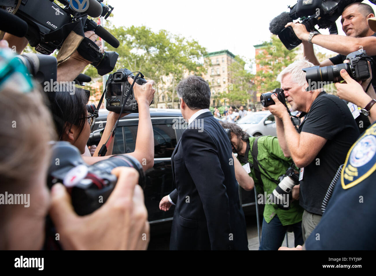 Attorney Michael Cohen walks out of Federal Courthouse after pleading