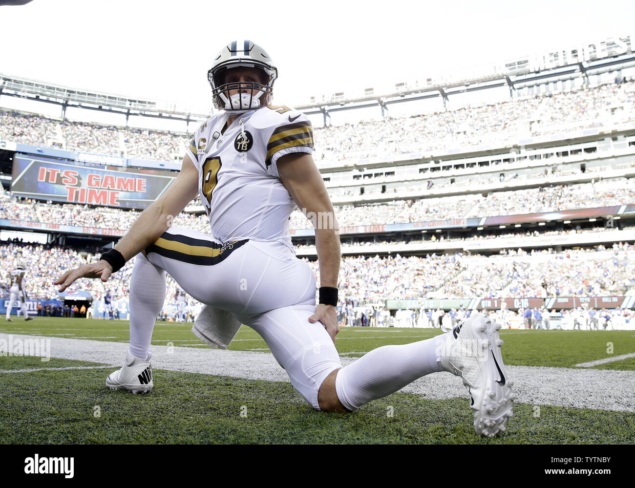 New Orleans Saints Drew Brees stretches on the sidelines before the game against the New York Giants in week 4 of the NFL season at MetLife Stadium in East Rutherford New Jersey
