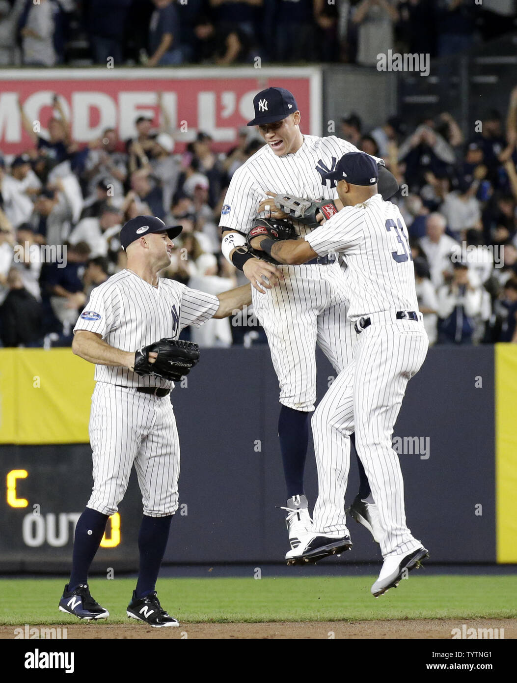 New York Yankees Brett Gardner, Aaron Judge and Aaron Hicks celebrate after  the game against the Oakland Athletics in the MLB American League wild card  game at Yankee Stadium in New York