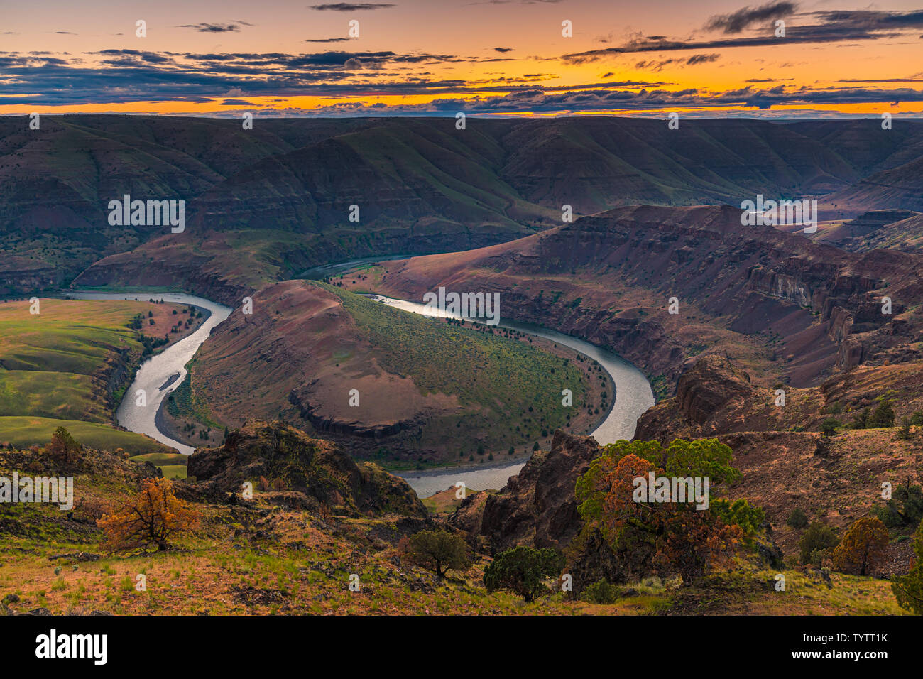 Sunset at the John Day River. The John Day River is a tributary of the Columbia River, approximately 284 miles (457 km) long, in northeastern Oregon i Stock Photo