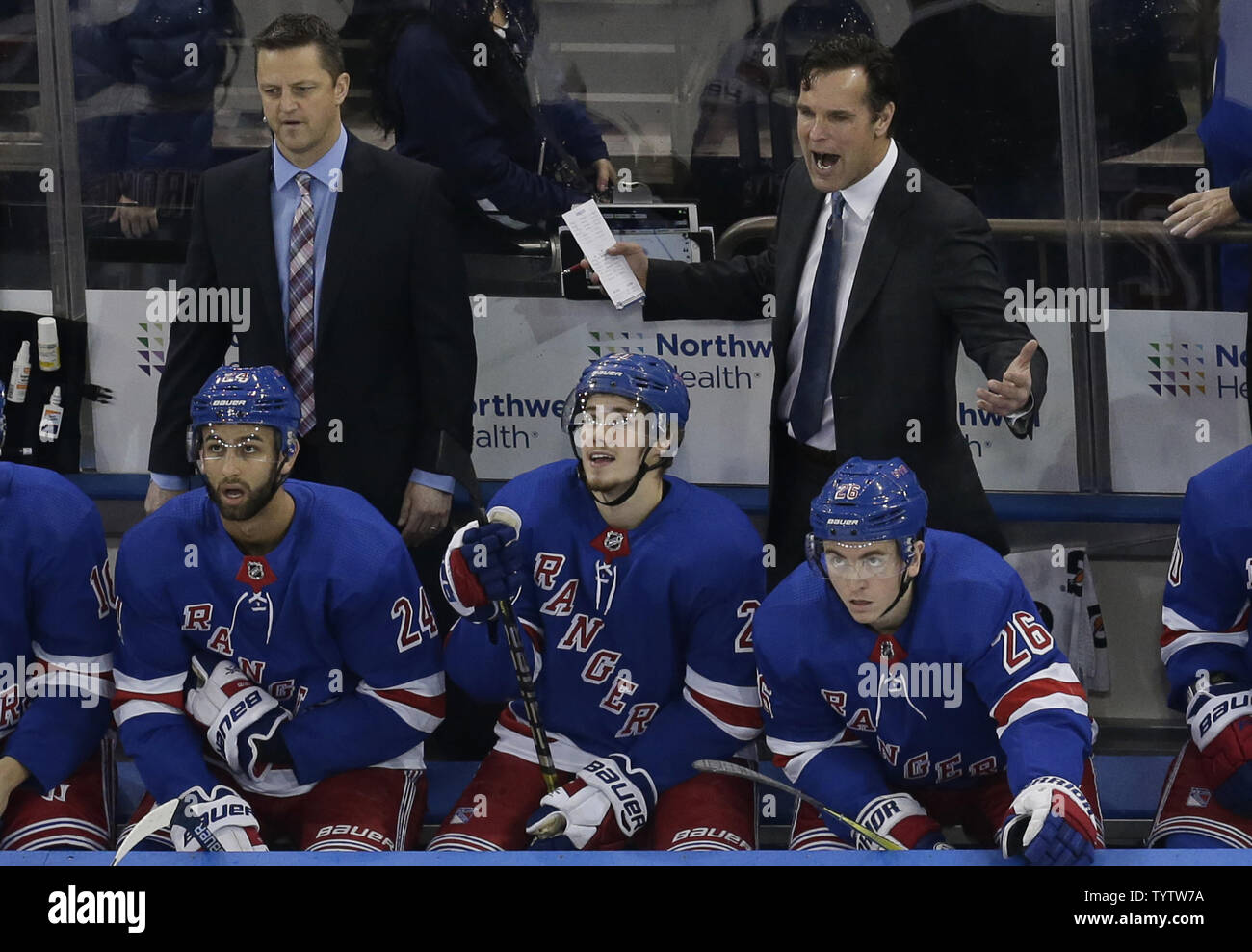 New York Rangers coach David Quinn shouts out from the bench in the