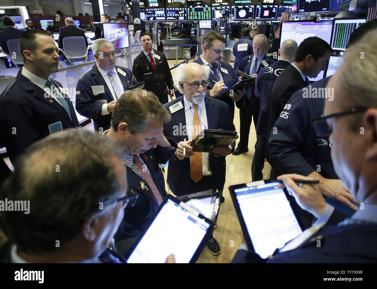 Traders Work On The Floor Of The Nyse At The Opening Bell At