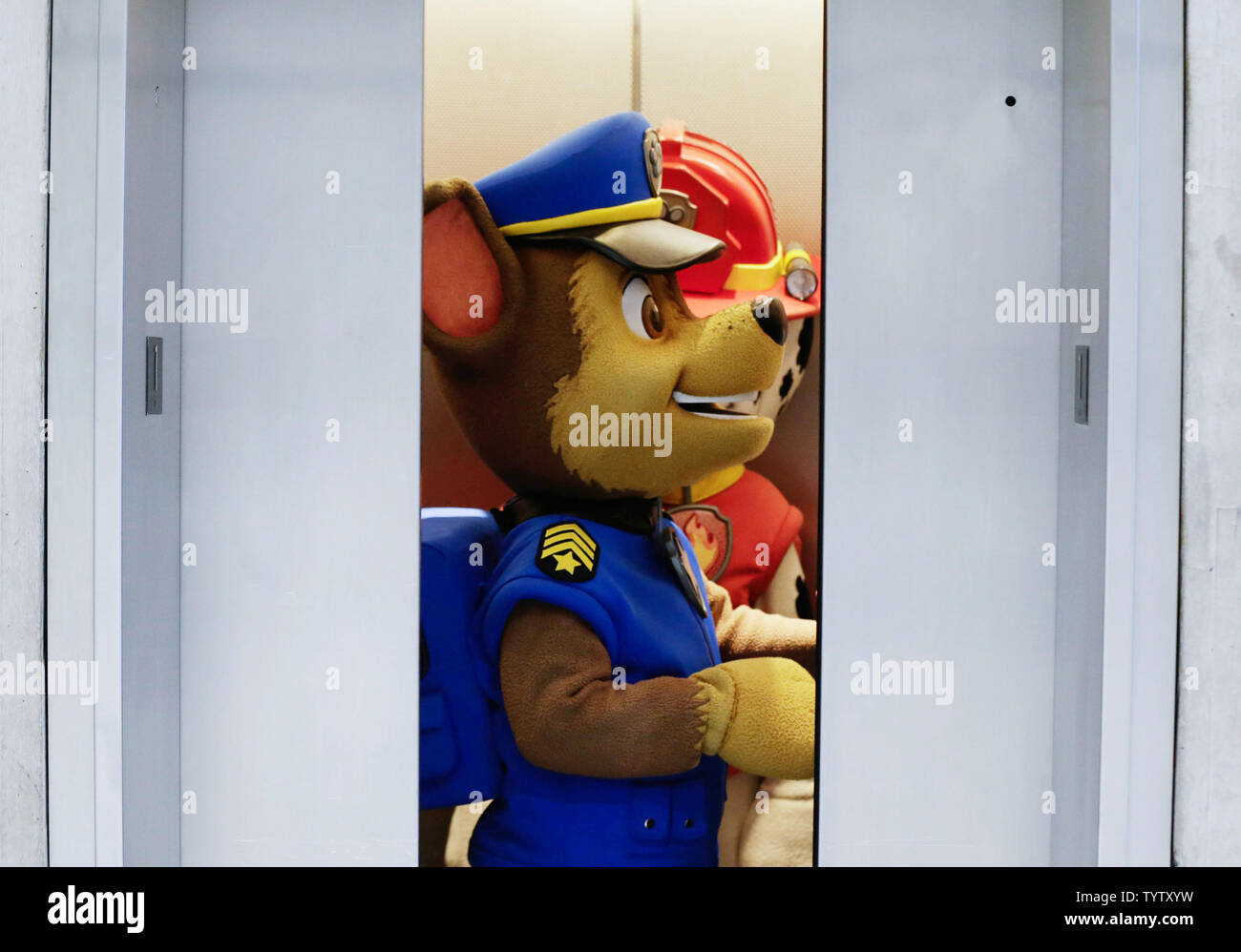Paw Patrol characters get into an elevator at the at 116th American  International Toy Fair at the Jacob K. Javits Convention Center in New York  City on February 16, 2019. This is