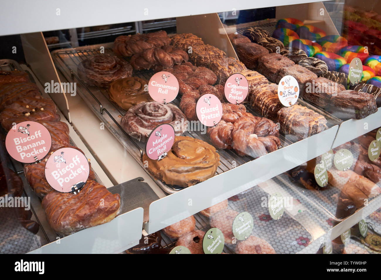 selection of speciality donuts on display in stans donuts and coffee coffee shop on damen in wicker park Chicago IL USA Stock Photo