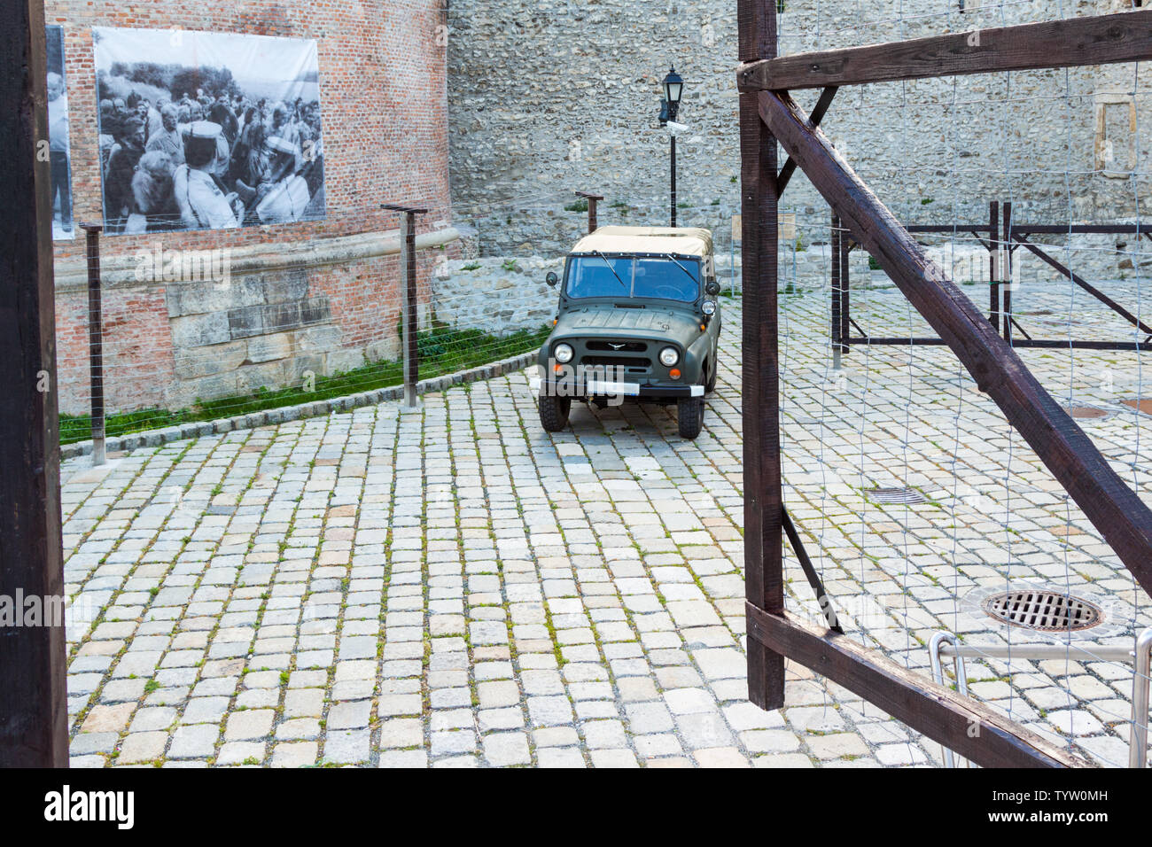 Street exhibition with UAZ-469 off-road vehicle and barbed wire fence in remembrance of Pan-European Picnic 1989, Sopron, Hungary Stock Photo
