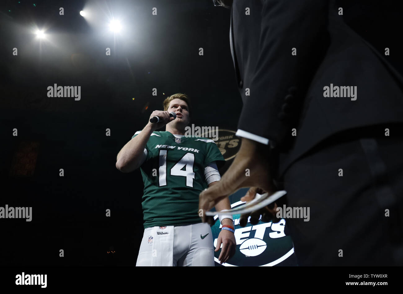 New York Jets quarterback Sam Darnold (14) models the new Jets NFL football uniforms with teammates when the New York Jets host a Uniform Launch Event at Gotham Hall in New York City on April 4, 2019. This is the first New York Jets overhaul of its uniforms since 1998.         Photo by John Angelillo/UPI Stock Photo