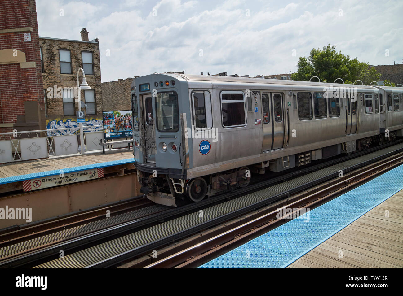 view of the blue line L train station at with train Damen Chicago IL USA Stock Photo