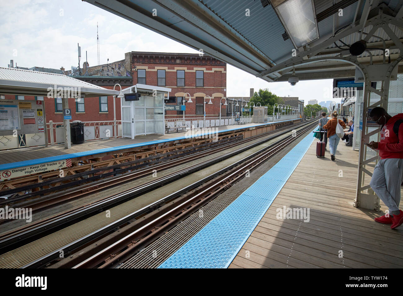 view of the blue line L train station at Damen Chicago IL USA Stock Photo