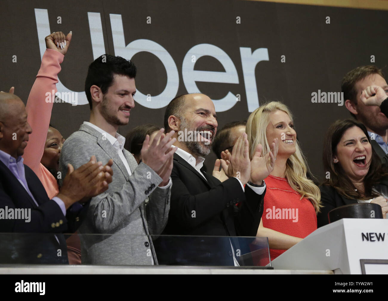 Uber CEO Dara Khosrowshahi rings the opening bell at the New York 