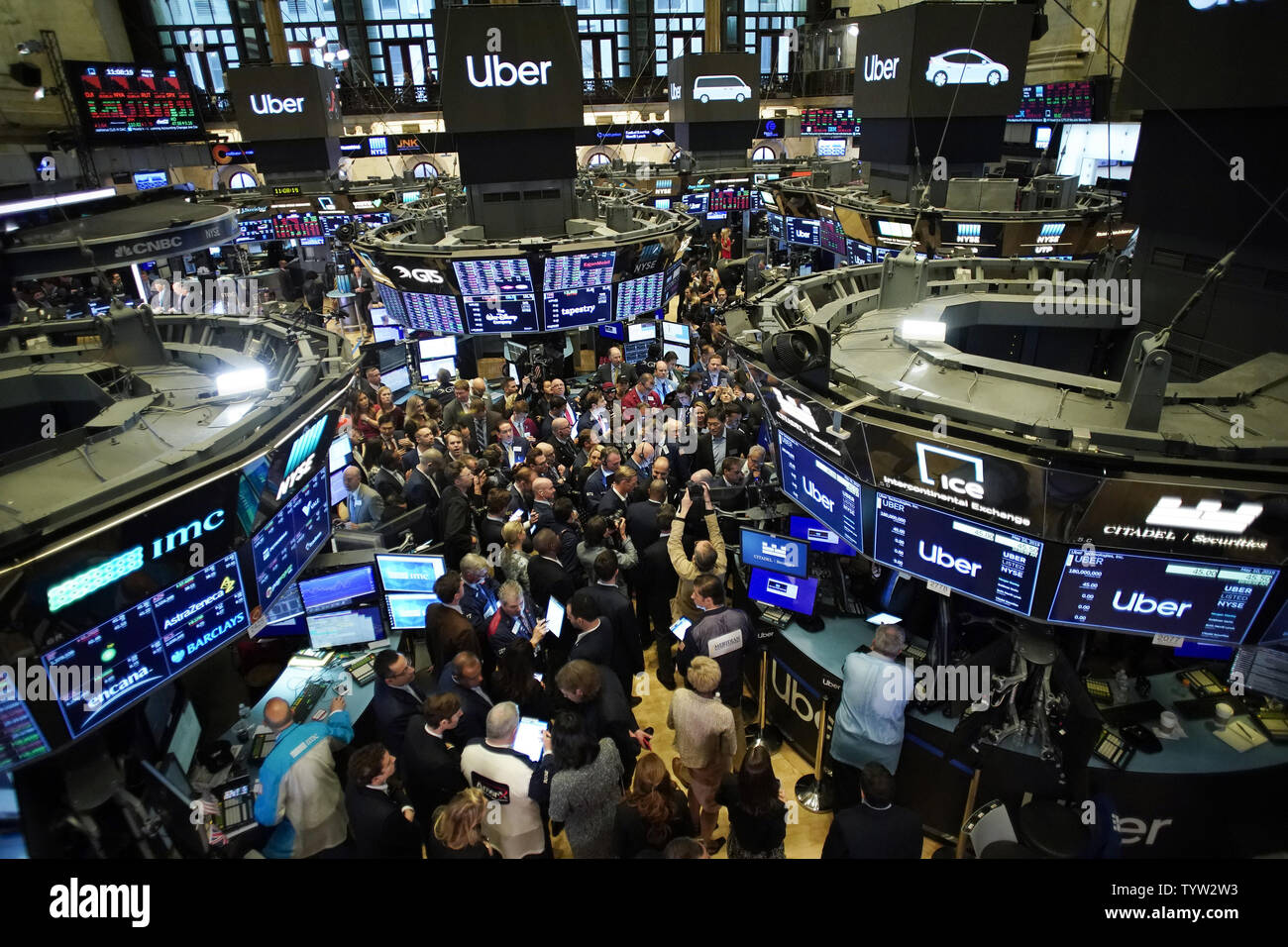 Traders work on the floor of the New York Stock Exchange before Uber begins trading for the first time on Wall Street in New York City on May 10, 2019. The ride-sharing company is set to begin trading on the New York Stock Exchange on Friday, under the symbol 'UBER'.   Photo by John Angelillo/UPI Stock Photo
